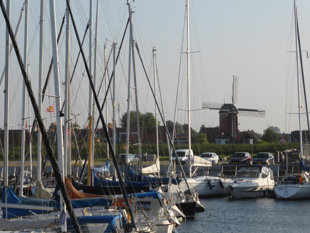 Villa Emilia - Gemuetliches Kinderfreundliches Blockhaus Mit Umzaeuntem Garten Sint Annaland Bagian luar foto